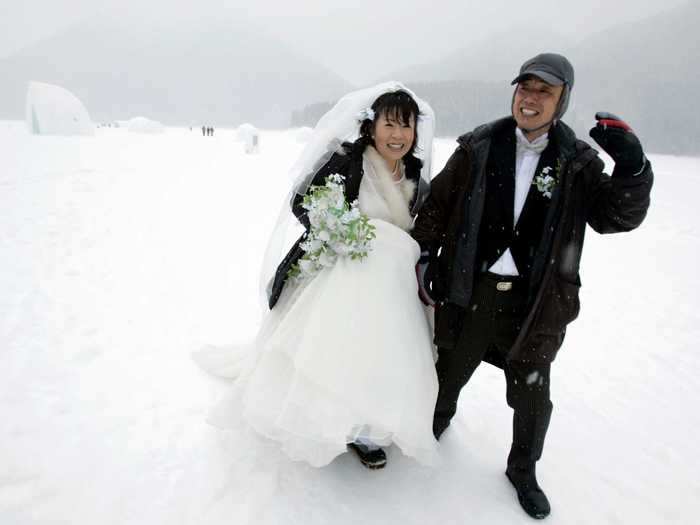 Many of these couples have to accessorize their wedding attire with winter jackets, gloves, hats, and more.