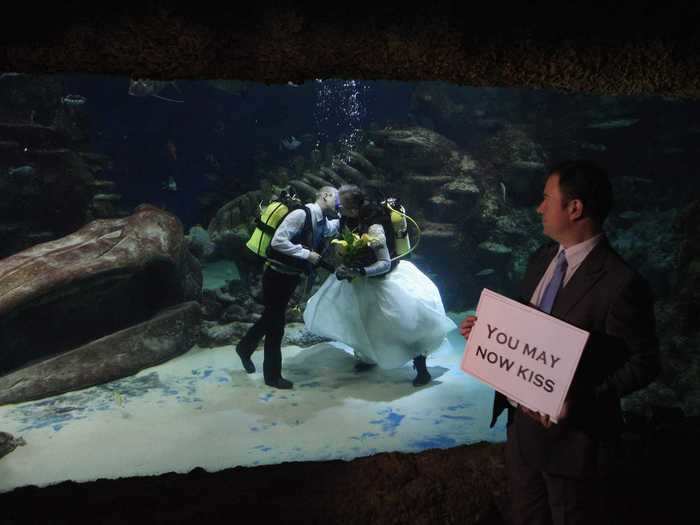 The underwater wedding still featured some traditional elements.