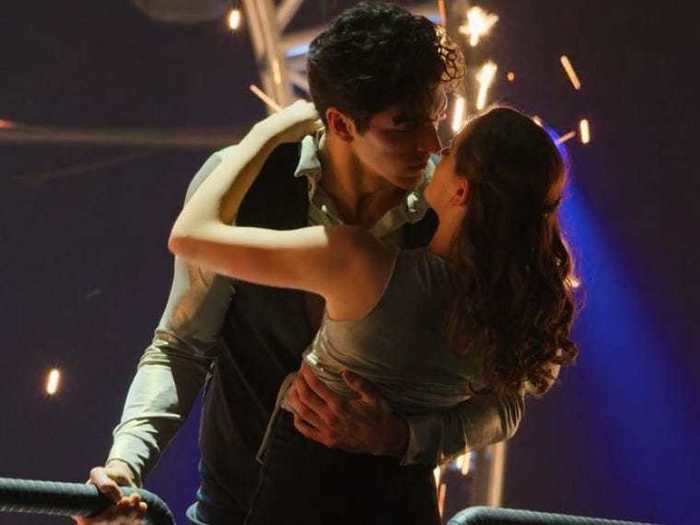 After avoiding the temptation during earlier scenes, Elle and Marco kiss during the dance competition, in front of a huge crowd and a livestream.