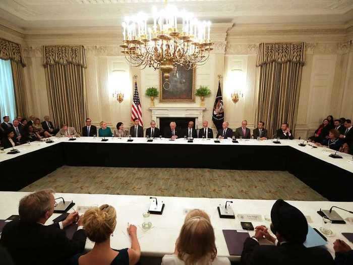 The State Dining Room now features gold-hued curtains.