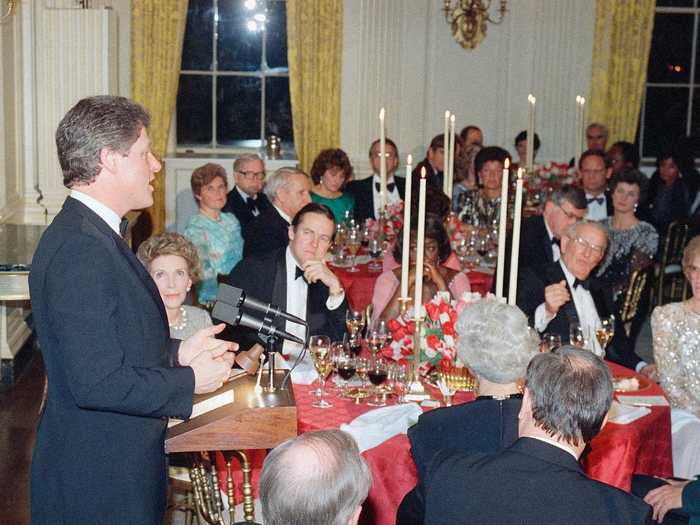 During the Reagan presidency, the State Dining Room was decorated with yellow drapes and red tablecloths.