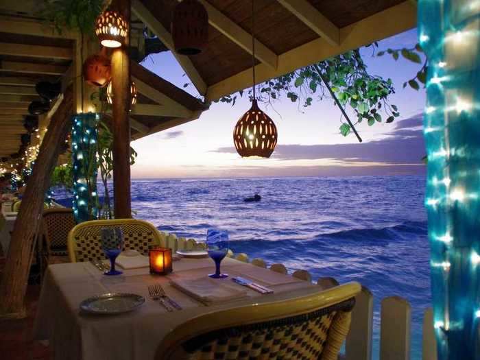 End your day with a relaxing dinner overlooking the sea.