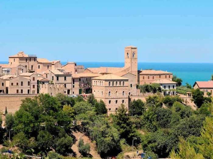 Roam through the medieval and renaissance buildings in Torre di Palme.