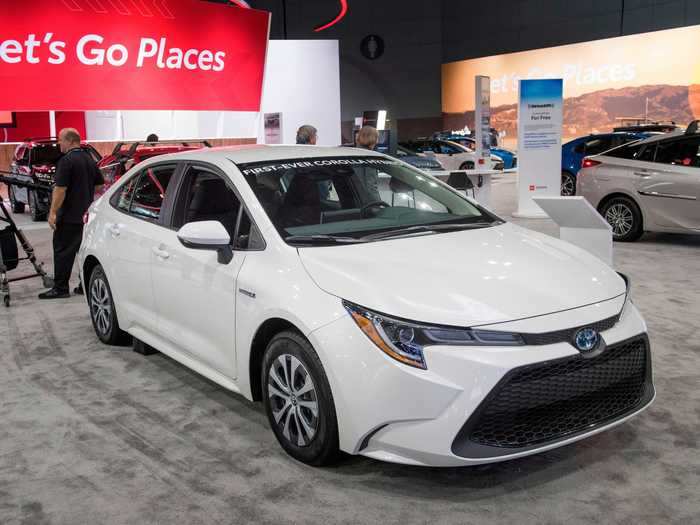 The latest Corolla model has modern features like safety alerts and an entertainment system.