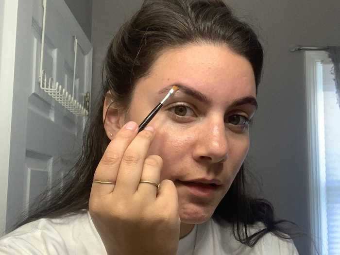 Step 3: Using your paintbrush, apply the tint only to the shape of the brow you have or will want to have after tinting. Use a cotton bud to clean up the shape.