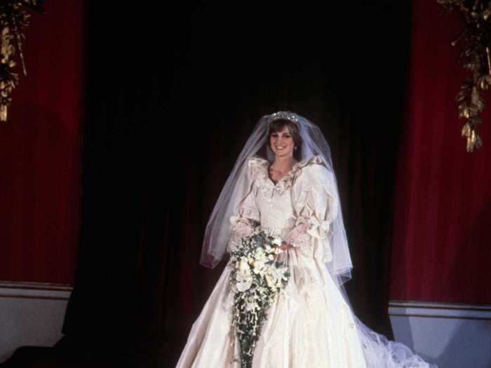 While there were plenty of wedding portraits of the happy couple and the royal family, below is a rare official solo photo taken of Diana at Buckingham Palace.