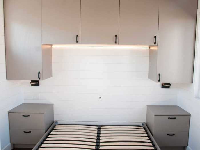 The LED light strip under the cabinets are dimmable, although there are two other light sconces beside the bed for extra brightness.