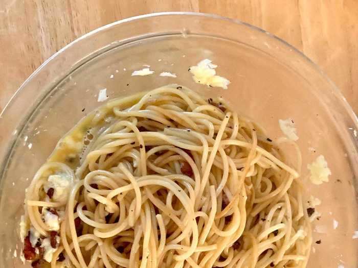 Then I added my pasta to the bowl of eggs and cheese and began to toss it.