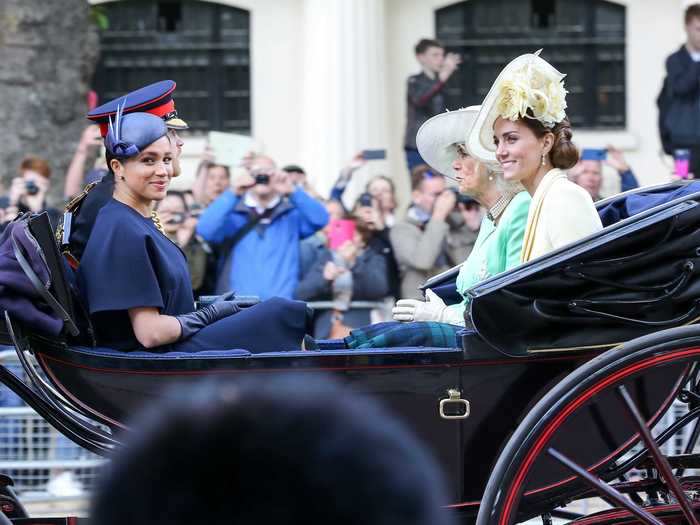 In her first appearance since giving birth, Markle was pictured alongside Harry, Middleton, the Duchess of Cornwall, and William (not pictured) at Trooping the Colour that June.