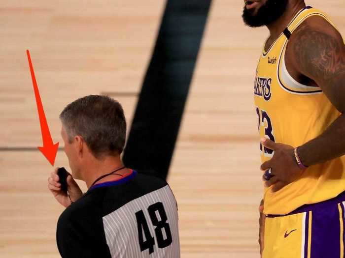 The referees wore cloth coverings over their whistles in an attempt to soak up spit.