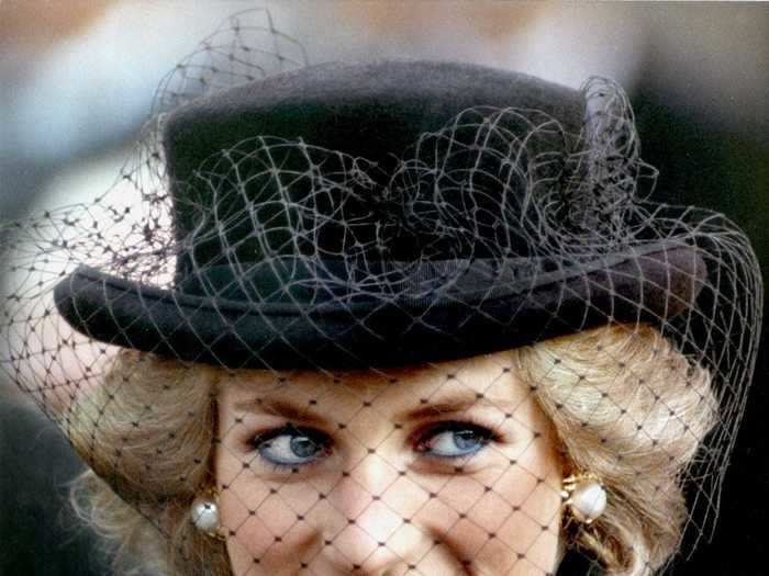 The princess wore many bold hats, including this elegant birdcage one.