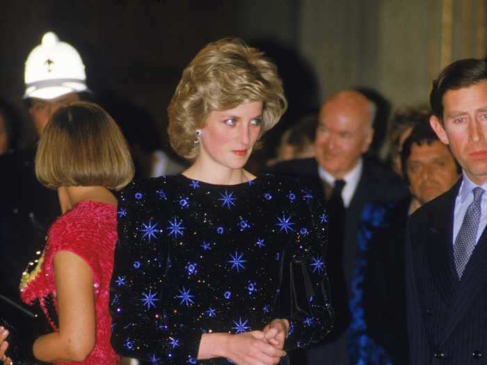 Princess Diana truly embraced the style of the 1980s in this shoulder-padded frock.