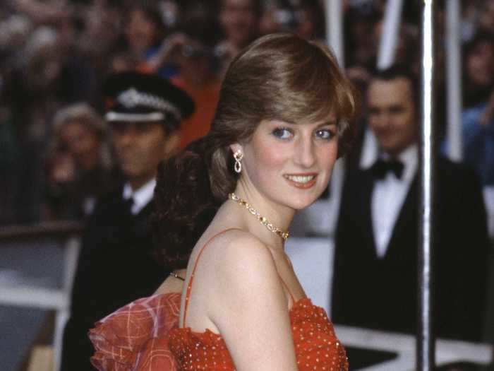 The princess stunned in this red, shoulder-baring gown in the summer of 1981.
