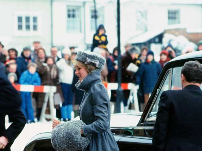 While she was engaged to Prince Charles, Princess Diana looked elegant in this blue, winter look.