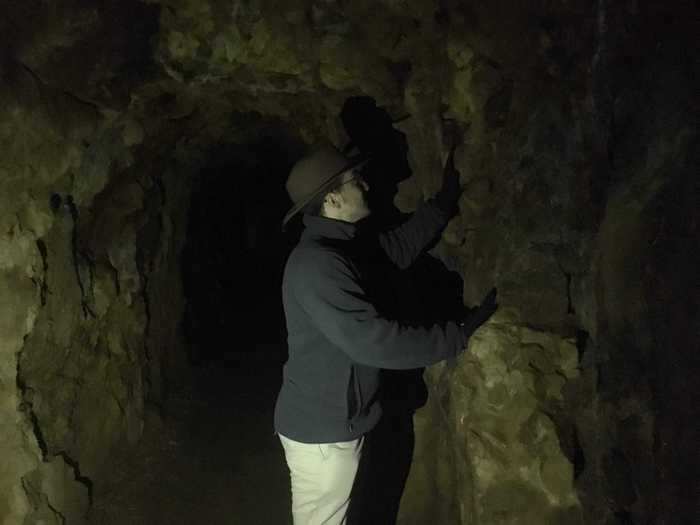 Using the flashlights from our phones, we explored the passageways where miners had once worked.