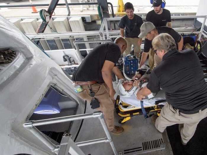 The recovery teams will retrieve the astronauts and give them a preliminary medical checkout.