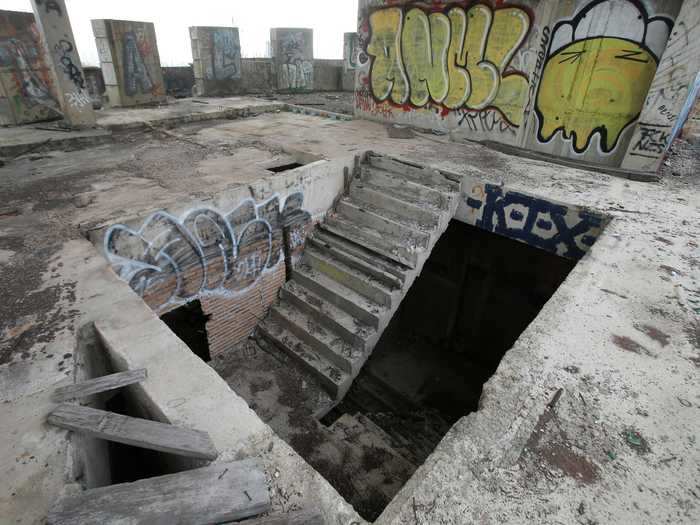 Dilapidated staircases lead to an equally dilapidated roof.