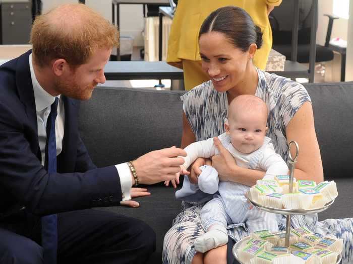 During the visit, Archie was more interested in the sweet treats on the table than the company.