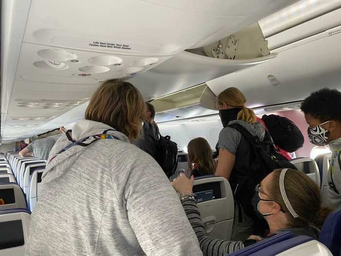 The deplaning experience was also the same, with everybody rushing to get up and off as quickly as possible.