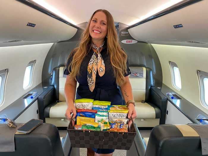 The crew is minimal with only two pilots and one cabin attendant serving all 16 passengers. After take-off, the snack and beverage service begins with brand name offerings like SkinnyPop and Cliff Bars.