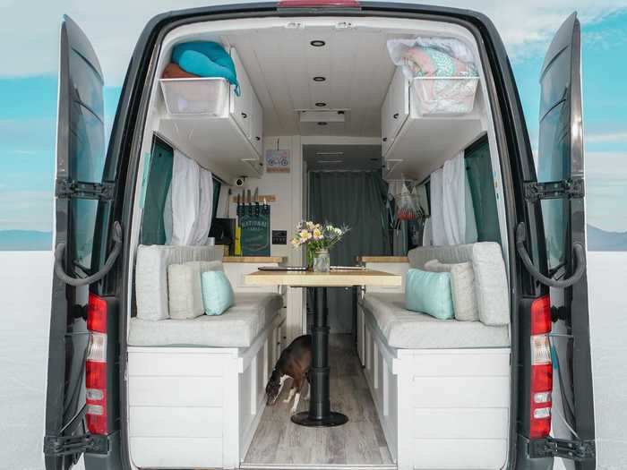 The couple recommends prioritizing having a bed that converts into working and eating space because beds take up a good amount of a van