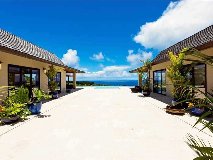 A central courtyard made of coral stone cuts through the home ...