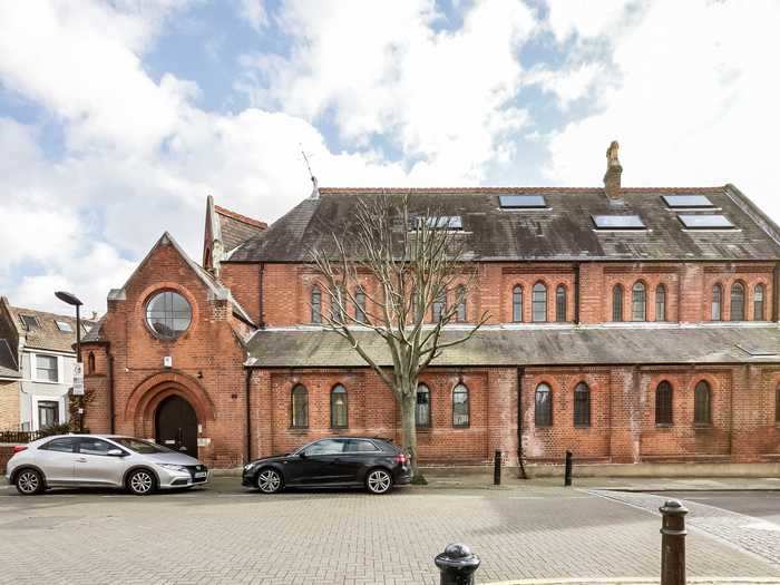 A Gothic church in London has been converted into an urban mansion.