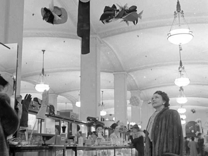 By the mid-1900s, Lord & Taylor began to evolve its visual style, including experimenting with whimsical displays like these hats suspended in the air.