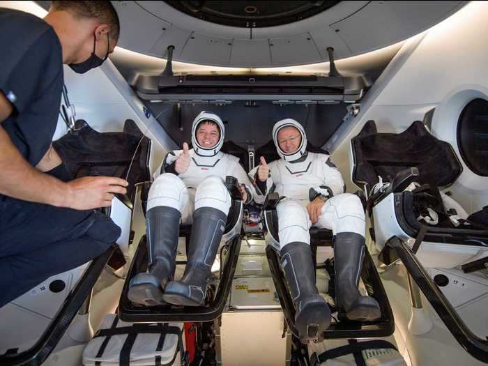 The recovery team then helped Behnken and Hurley out of their seats and onto stretchers — a standard procedure for astronauts post-landing — so they could get immediate medical evaluations.