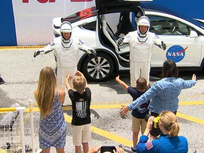 The men said goodbye to their families. Both are married to astronauts, and they each have a young son.