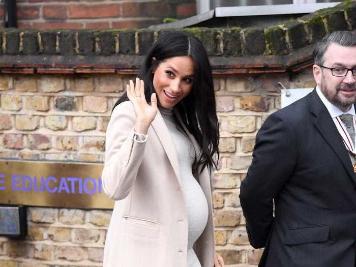 January 2019: The world was on baby watch as the duchess showed off her blossoming bump during a visit to Mayhew Animal Welfare Charity in London.