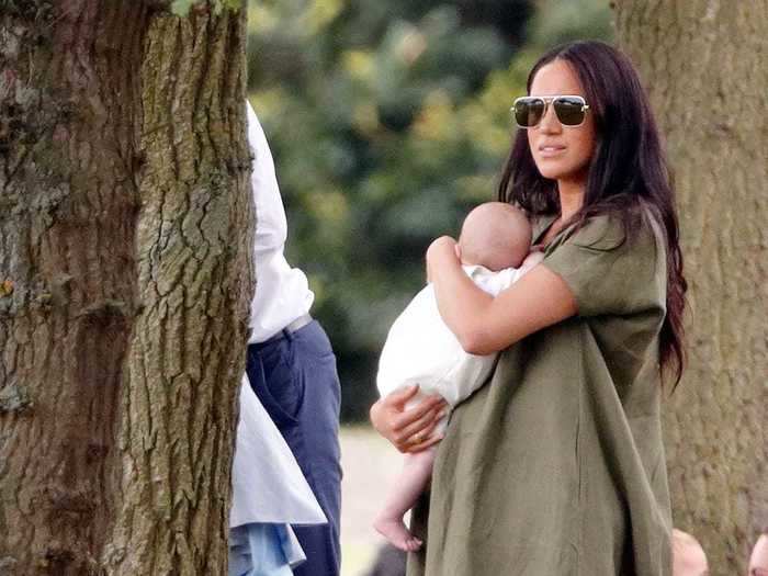 Markle wore an olive-green caftan dress to a polo match in July 2019, where Prince William and Prince Harry competed.