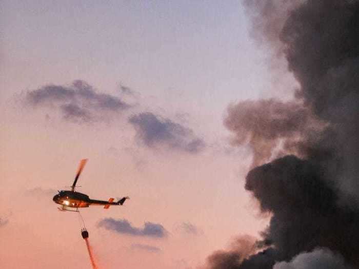 Emergency firefighting assets, including helicopters, were called up in response.