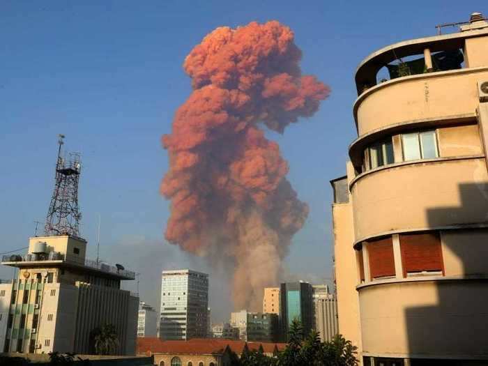 An orange-red cloud lingered over the blast site shortly after the explosion.