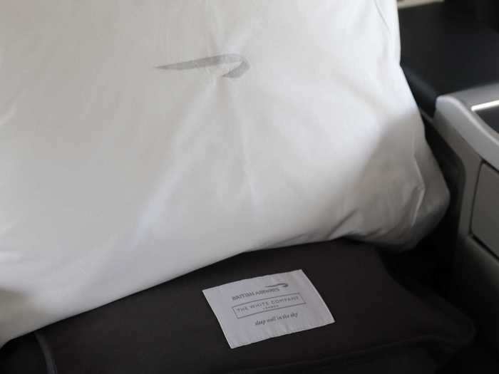 Amenities and features at each seat standard for business class included a plush pillow and blanket kit from The White Company....