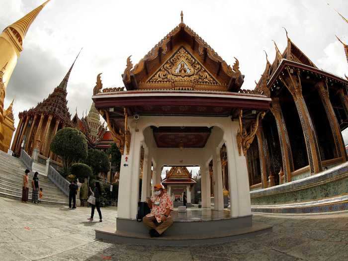 The Grand Palace saw only a handful of tourists as the country has not yet reopened to international visitors, per CNN.