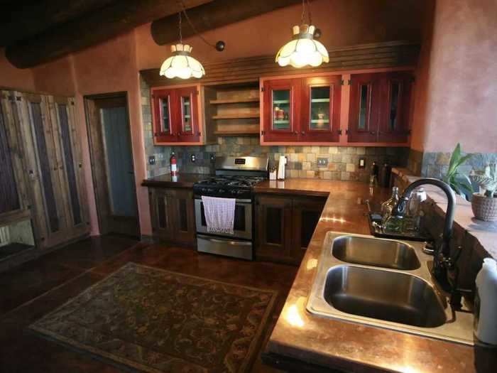 The large kitchen and spacious living room make this Earthship ideal for a family.