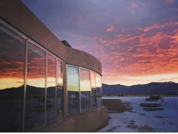 The Taos Earthship: Modern + Mesa is a two-bedroom home that features unique architecture.