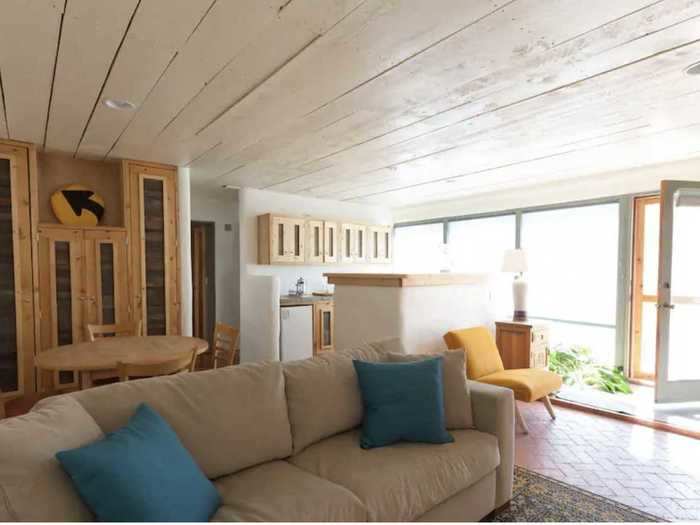 The modern Earthship has a bright interior and tons of natural light.