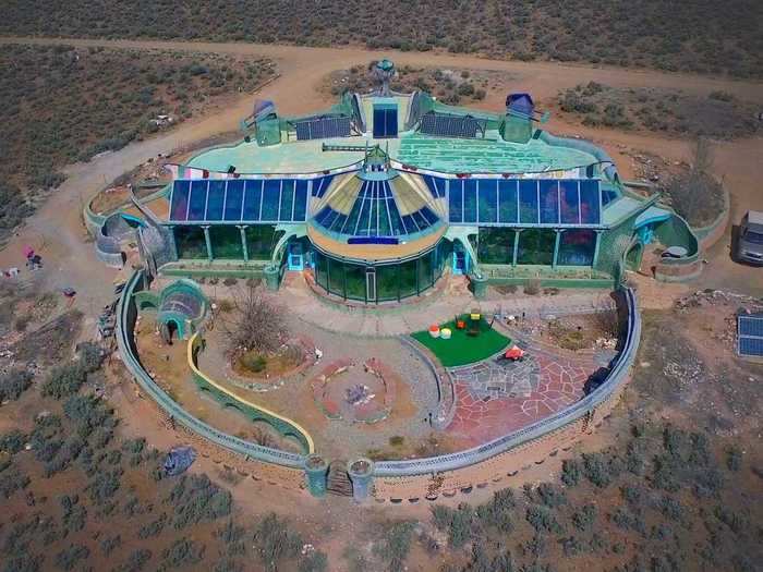 One Earthship available to rent on Airbnb is the Phoenix Earthship, which has a spacious garden and stunning views.