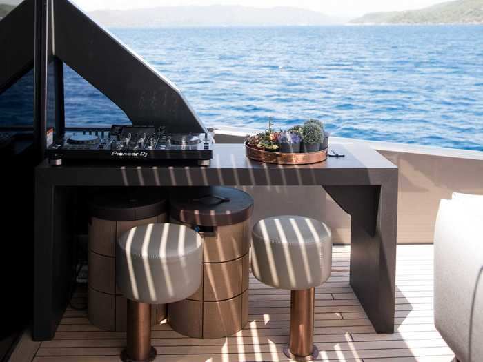 The rear deck boasts a small bar area with room for a DJ station ...