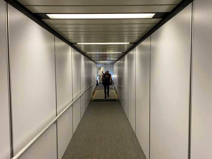 Zone 3 comprised of those sitting in the back of the plane with Zone 4 – for those slightly closer to the front – boarding last in a quasi-back to front-style boarding. Unlike the gate area, the jetway had no social distancing reminders whatsoever.