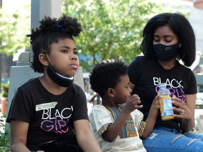 For Genisha Metcalf, 33, a mother of two children, participating in peaceful demonstrations is a chance to educate her children on what it means to be Black in the US.