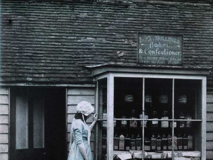 A girl is shown peering into a bakery called Billings.