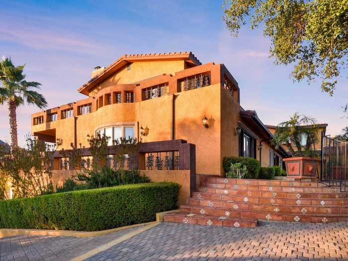 ... and balconies wrap around the entire home.