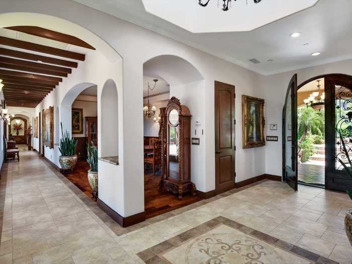 Archways, 10-foot ceilings, and wide hallways make the inside feel spacious.