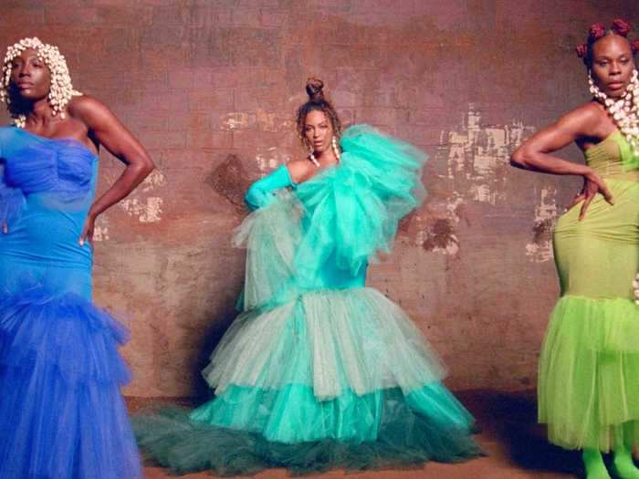 Her aqua-colored gown was custom-made by Black-owned fashion house KEÄMA.