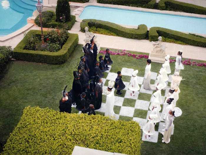 A human chessboard emphasizes the concept of duality.