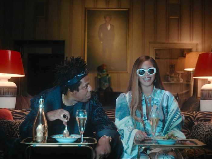 Beyoncé and Jay-Z share a similar — albeit more casual — moment when they eat dinner together in front of the TV.