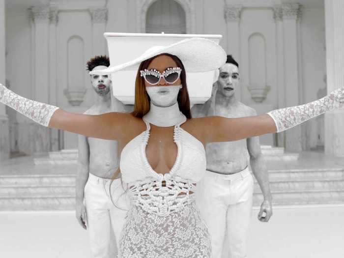 Beyoncé performs "Nile" in an all-white lace-and-rope dress.